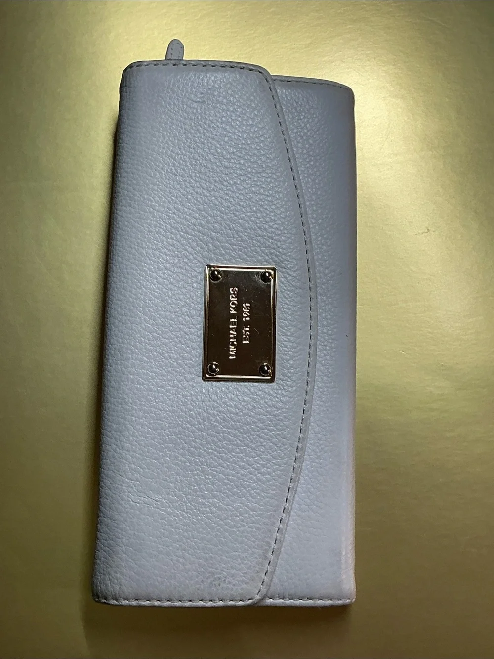 Michael Kors previously owned